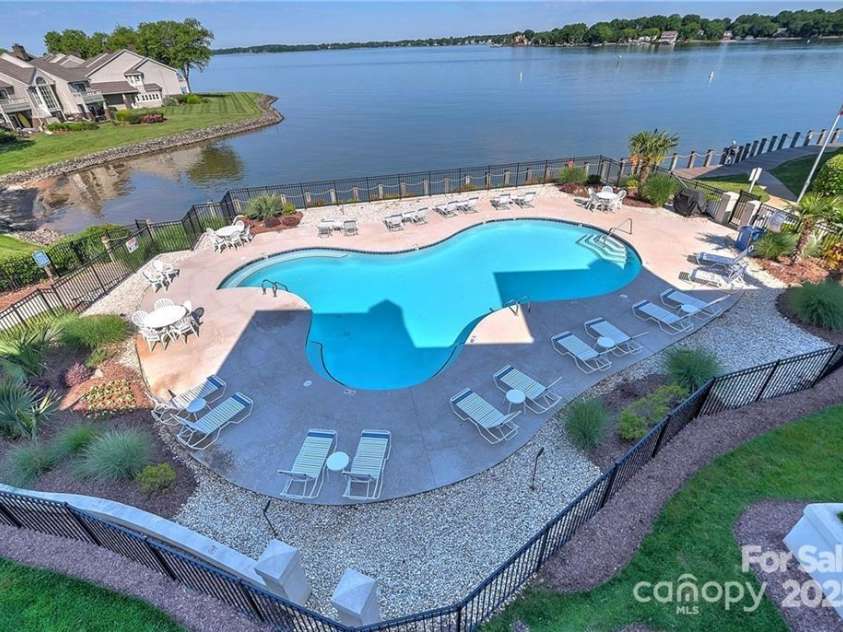 18647 Vineyard Point Lane, Cornelius, NC 28031.  MLS# CAR4294074, YatesRealty ID 34373. Community Pool with long range views of Lake Norman