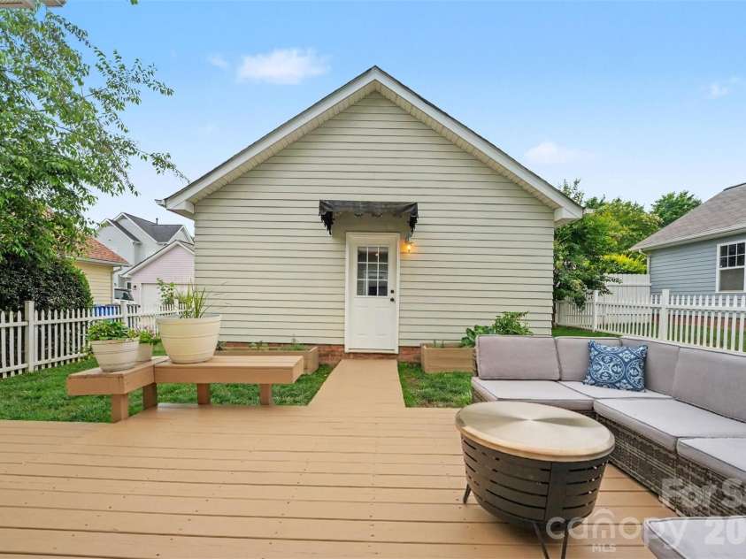 116 Decatur Avenue, Mooresville, NC 28117.  MLS# CAR4383348, YatesRealty ID 34376. Deck with boardwalk to Garage