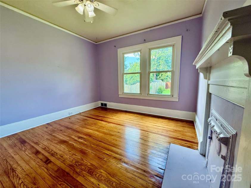 122 Beaver Street, Forest City, NC 28043.  MLS# CAR4294326, YatesRealty ID 34376. Middle bedroom