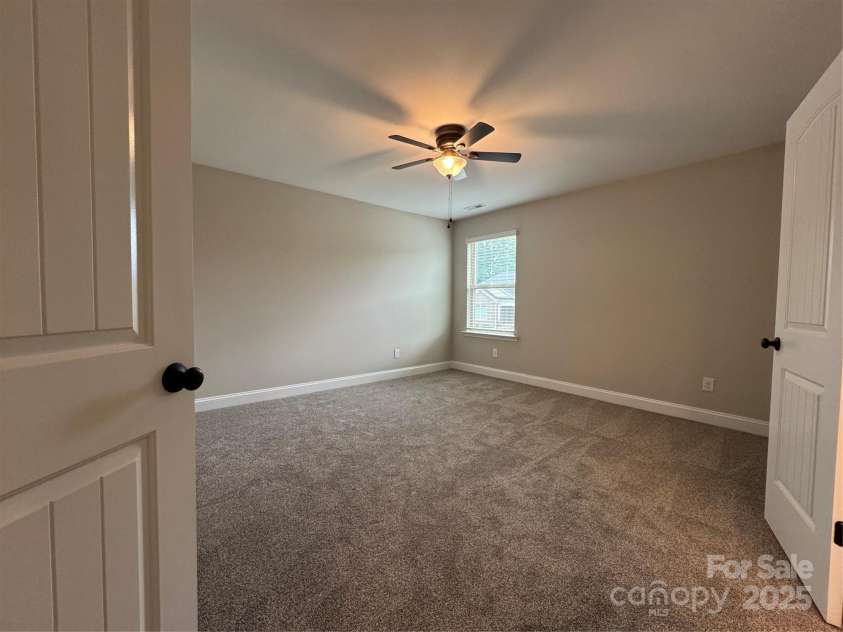 135 Coral Rutledge Drive, Mount Holly, NC 28120.  MLS# CAR4294017, YatesRealty ID 34378. Bedroom 3