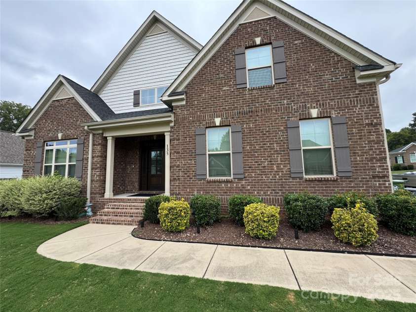135 Coral Rutledge Drive, Mount Holly, NC 28120.  MLS# CAR4294017, YatesRealty ID 34378. Exterior 4