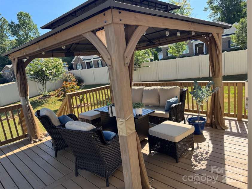 135 Coral Rutledge Drive, Mount Holly, NC 28120.  MLS# CAR4294017, YatesRealty ID 34378. Fenced Rear Yard