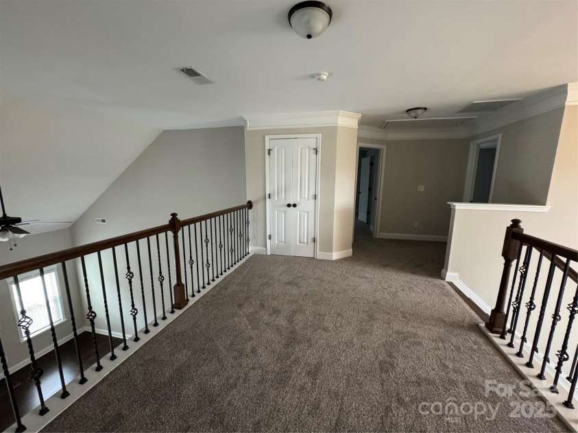 135 Coral Rutledge Drive, Mount Holly, NC 28120.  MLS# CAR4294017, YatesRealty ID 34378. Loft