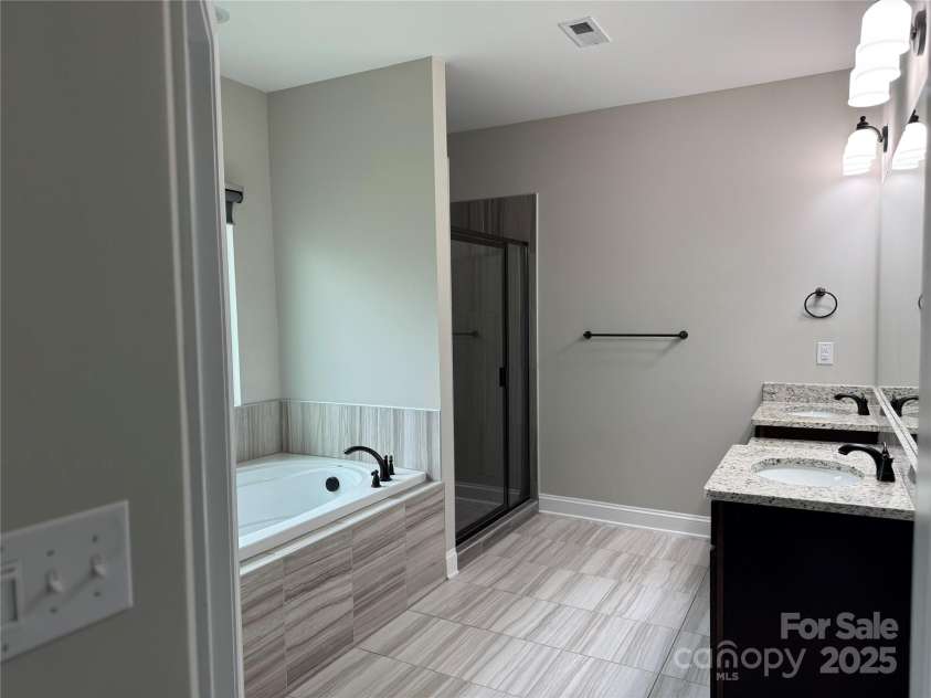 135 Coral Rutledge Drive, Mount Holly, NC 28120.  MLS# CAR4294017, YatesRealty ID 34378. Primary Bath 2