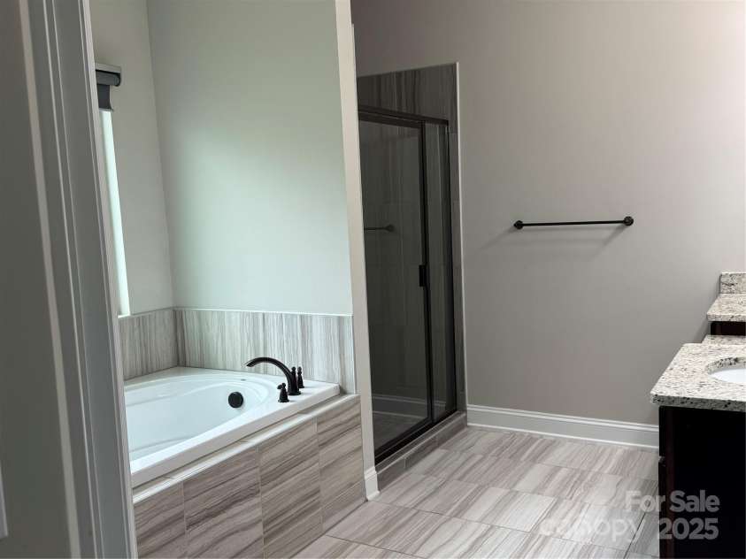 135 Coral Rutledge Drive, Mount Holly, NC 28120.  MLS# CAR4294017, YatesRealty ID 34378. Primary Bath