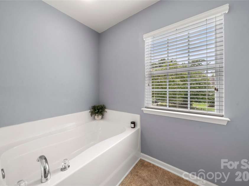 3009 Canopy Drive, Indian Trail, NC 28079.  MLS# CAR4292578, YatesRealty ID 34383. Primary bath