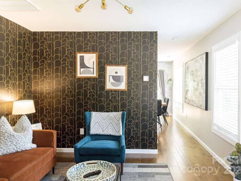 301 Jenna Clare Lane, Asheville, NC 28803.  MLS# CAR4155644, YatesRealty ID 34385. Located just minutes from downtown Asheville and the Blue Ridge Parkway, this turnkey home showcases high-end features like granite countertops, engineered hardwood floors, and chic lighting.