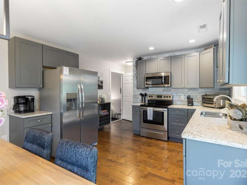 301 Jenna Clare Lane, Asheville, NC 28803.  MLS# CAR4155644, YatesRealty ID 34385. Stainless steel appliances