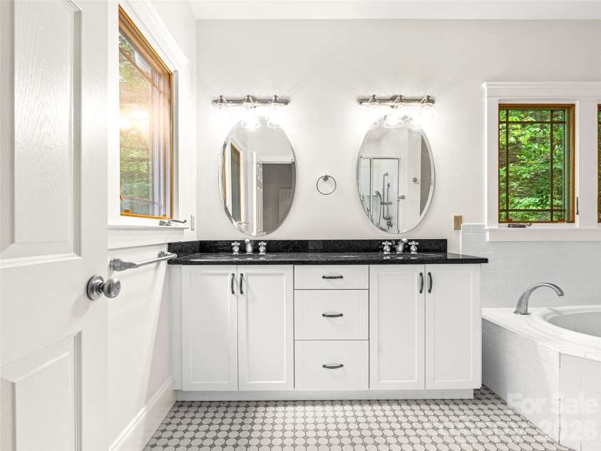 890 Stoney Stream Lane, Arden, NC 28704.  MLS# CAR4395817, YatesRealty ID 34385. Double vanity in primary ensuite bathroom. 