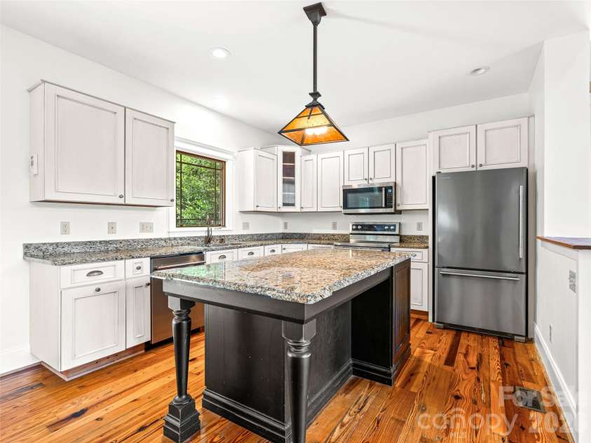 890 Stoney Stream Lane, Arden, NC 28704.  MLS# CAR4395817, YatesRealty ID 34385. Kitchen with new appliances and large island.