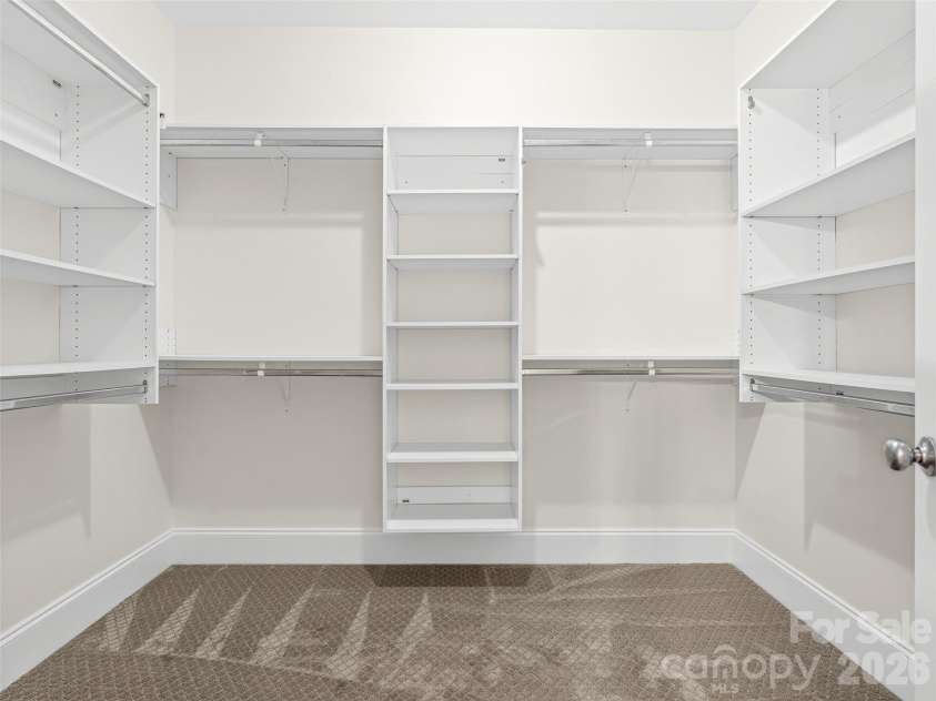 890 Stoney Stream Lane, Arden, NC 28704.  MLS# CAR4395817, YatesRealty ID 34385. Large walk-in primary closet.