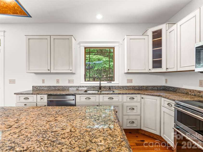 890 Stoney Stream Lane, Arden, NC 28704.  MLS# CAR4395817, YatesRealty ID 34385. Lots of storage and lovely view of back yard.