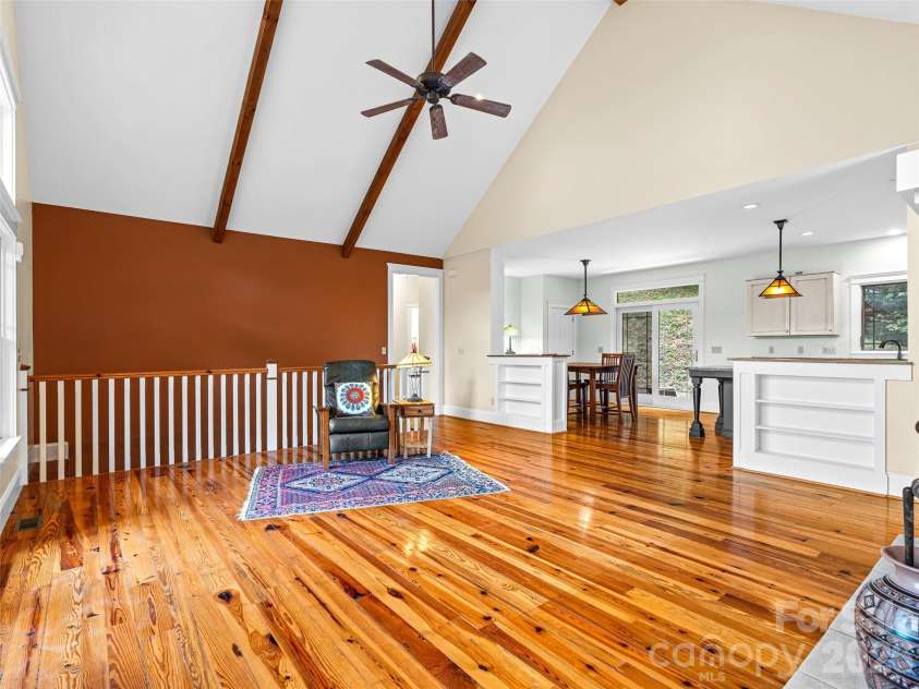 890 Stoney Stream Lane, Arden, NC 28704.  MLS# CAR4395817, YatesRealty ID 34385. Lovely wood floors throughout main living area. 