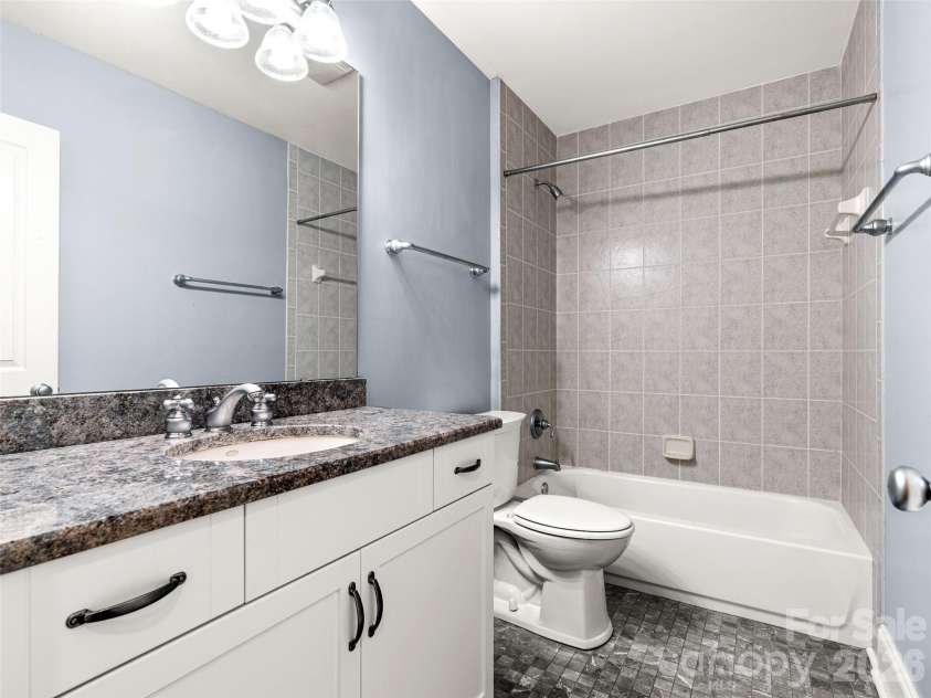 890 Stoney Stream Lane, Arden, NC 28704.  MLS# CAR4395817, YatesRealty ID 34385. Lower level full bathroom