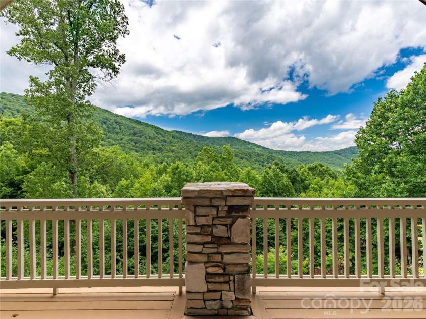 890 Stoney Stream Lane, Arden, NC 28704.  MLS# CAR4395817, YatesRealty ID 34385. Stunning mountain views from main level deck.