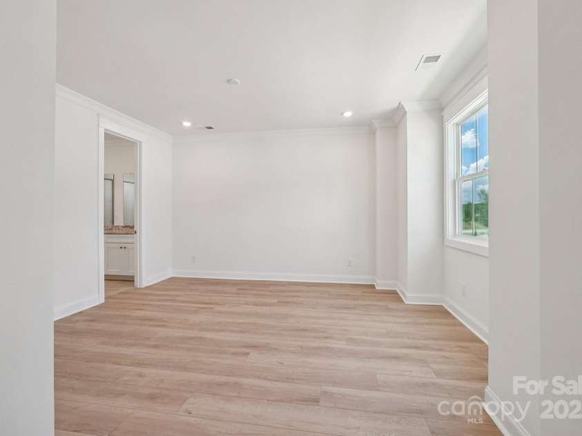 908 Coast Drive, Tega Cay, SC 29708.  MLS# CAR4289755, YatesRealty ID 34388. Primary bedroom