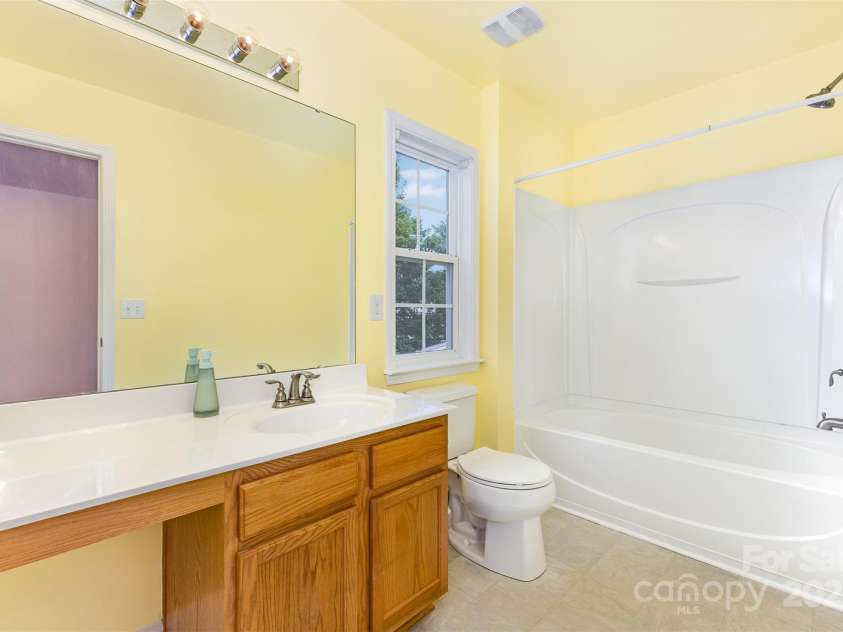 5009 Manchineel Lane, Monroe, NC 28110.  MLS# CAR4289637, YatesRealty ID 34389. Hall Bathroom