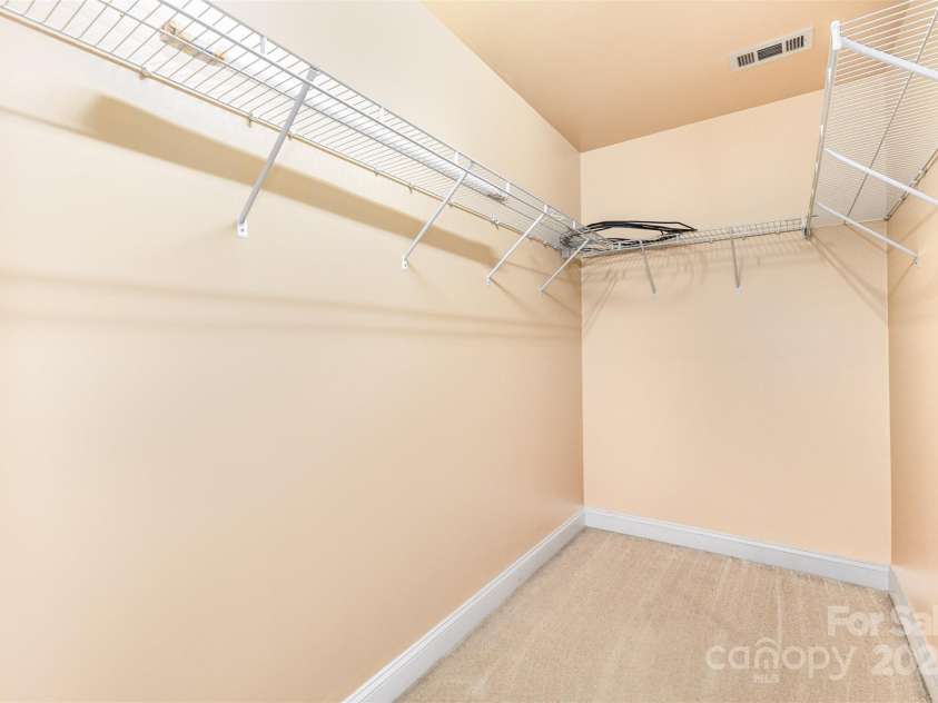5009 Manchineel Lane, Monroe, NC 28110.  MLS# CAR4289637, YatesRealty ID 34389. Owner Suite walk-in closet
