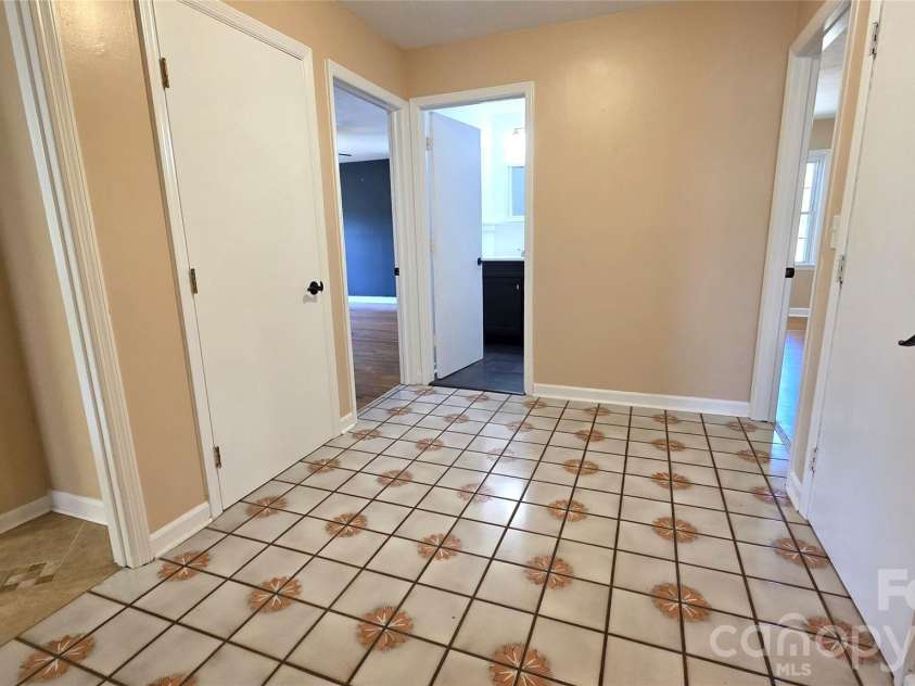 1627 Greenville Highway, Hendersonville, NC 28792.  MLS# CAR4338337, YatesRealty ID 34391. Hallway to bedrooms and Baths
