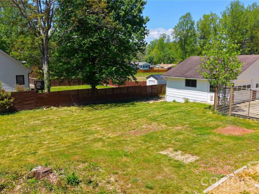 1627 Greenville Highway, Hendersonville, NC 28792.  MLS# CAR4338337, YatesRealty ID 34391. Large back yard