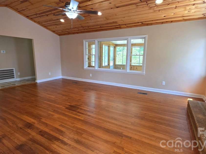 1627 Greenville Highway, Hendersonville, NC 28792.  MLS# CAR4338337, YatesRealty ID 34391. Main Room with Fireplace