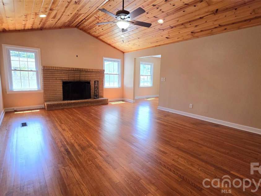1627 Greenville Highway, Hendersonville, NC 28792.  MLS# CAR4338337, YatesRealty ID 34391. Main Room with Fireplace