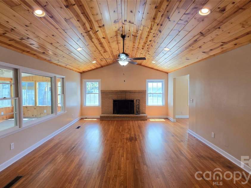 1627 Greenville Highway, Hendersonville, NC 28792.  MLS# CAR4338337, YatesRealty ID 34391. Main Room with Fireplace