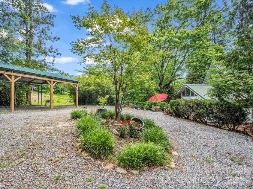 23 Sunset Drive, Black Mountain, NC 28711.  MLS# CAR4397312, YatesRealty ID 34401. Circular Drive & Three-Car Carport