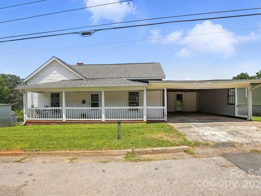 310 Sidney Johnson Street, Fort Mill, SC 29715.  MLS# CAR4274696, YatesRealty ID 34404. 310 Sidney Johnson Street, a charming mill home near Walter Elisha Park