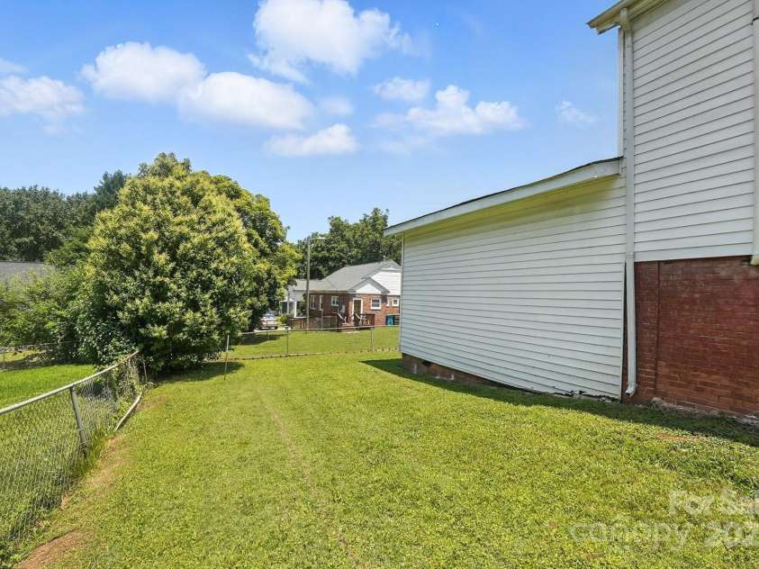 310 Sidney Johnson Street, Fort Mill, SC 29715.  MLS# CAR4274696, YatesRealty ID 34404. Back yard