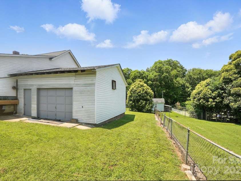 310 Sidney Johnson Street, Fort Mill, SC 29715.  MLS# CAR4274696, YatesRealty ID 34404. Detached garage/workshop