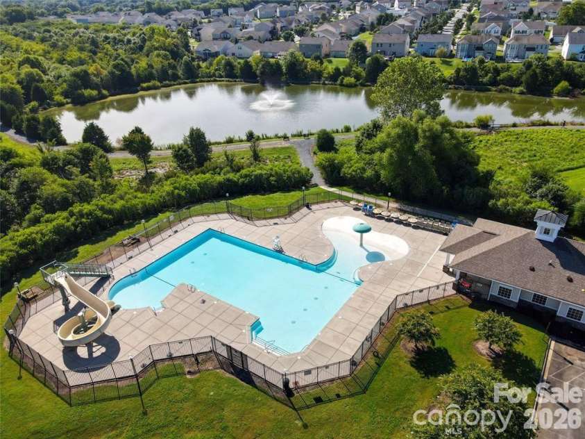 3585 Leighton Drive, Concord, NC 28027.  MLS# CAR4397371, YatesRealty ID 34404. Community Pool and Playground