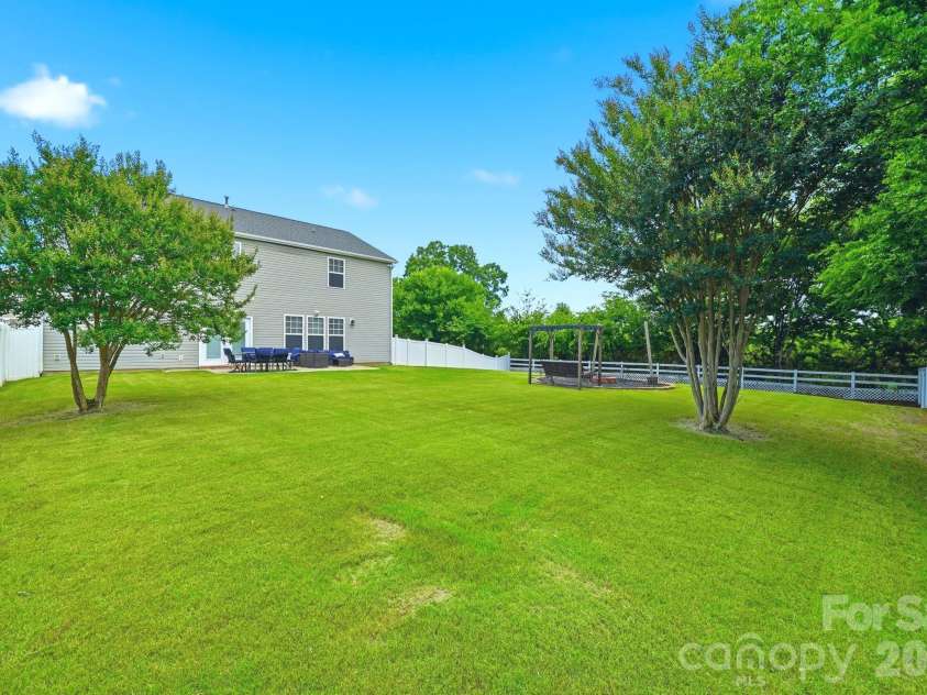 3585 Leighton Drive, Concord, NC 28027.  MLS# CAR4397371, YatesRealty ID 34404. Large Fenced in Back Yard