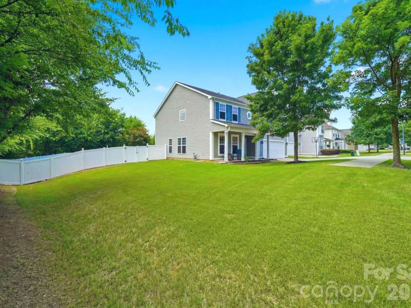 3585 Leighton Drive, Concord, NC 28027.  MLS# CAR4397371, YatesRealty ID 34404. Large front side yard
