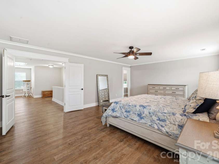 3585 Leighton Drive, Concord, NC 28027.  MLS# CAR4397371, YatesRealty ID 34404. Primary Suite Welcomes you through Double Doors