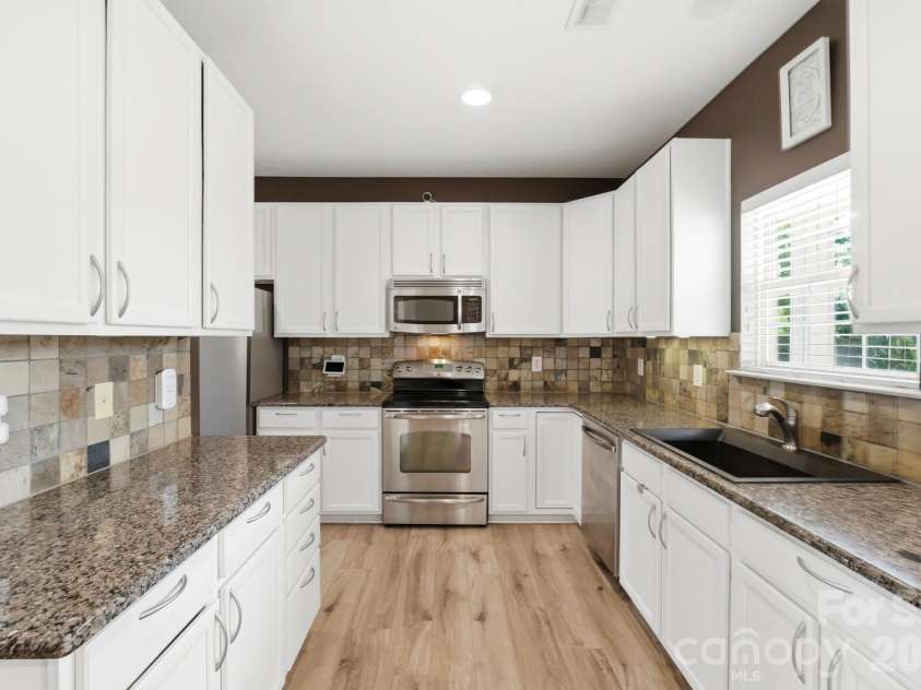 2616 Sierra Chase Drive, Monroe, NC 28112.  MLS# CAR4398992, YatesRealty ID 34413. Spacious kitchen, ready for entertaining