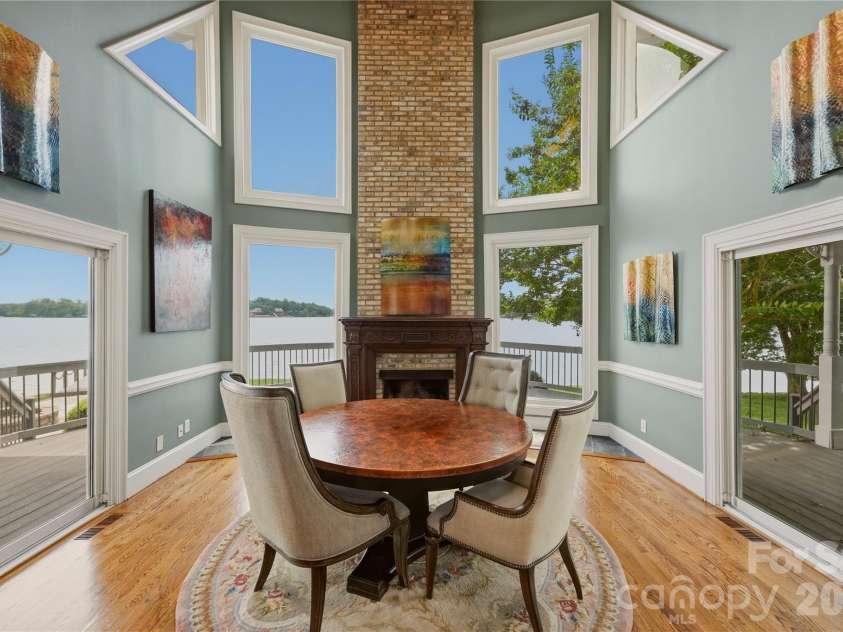 4872 Liberty Hill Road, York, SC 29745.  MLS# CAR4397290, YatesRealty ID 34418. Formal dining with vaulted ceiling, fireplace, and glorious lake views