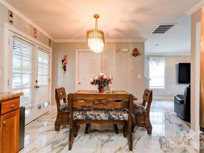 9336 Dewey Drive, Charlotte, NC 28214.  MLS# CAR4399418, YatesRealty ID 34426. DINING ROOM AREA 