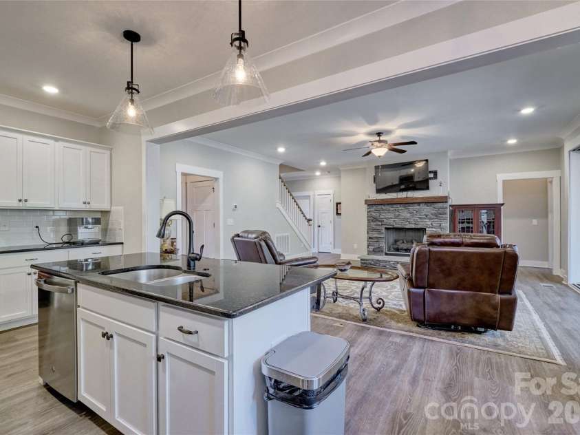 398 Kingsburry Road, Clover, SC 29710.  MLS# CAR4337912, YatesRealty ID 3443. Kitchen island to great room