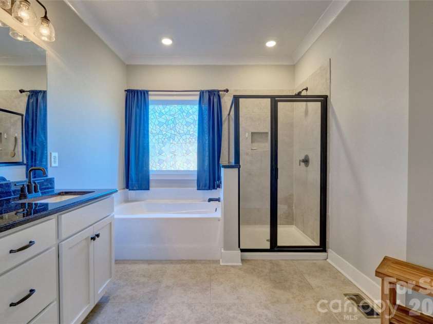 398 Kingsburry Road, Clover, SC 29710.  MLS# CAR4337912, YatesRealty ID 3443. Separate soaking tub and shower