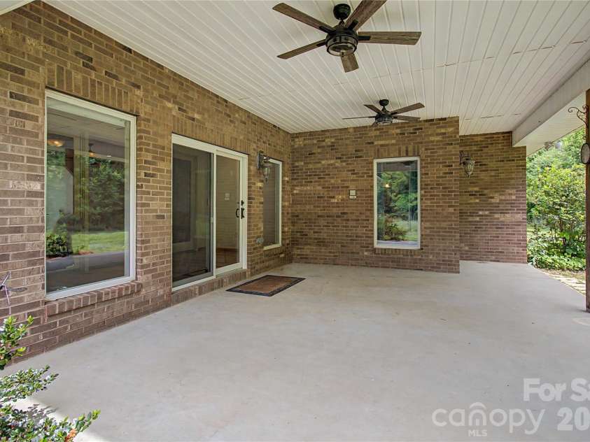 340 Earlys Mountain Road, Leicester, NC 28748.  MLS# CAR4398900, YatesRealty ID 34431. Covered back patio