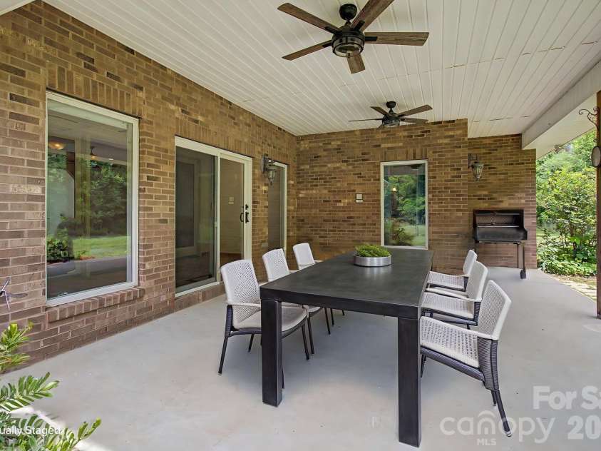 340 Earlys Mountain Road, Leicester, NC 28748.  MLS# CAR4398900, YatesRealty ID 34431. Covered back patio.Virtually Staged 