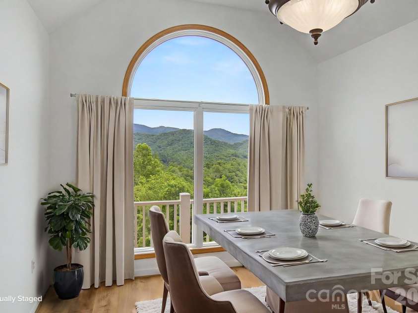 340 Earlys Mountain Road, Leicester, NC 28748.  MLS# CAR4398900, YatesRealty ID 34431. Dining Area with Mountain Views. Virtually staged