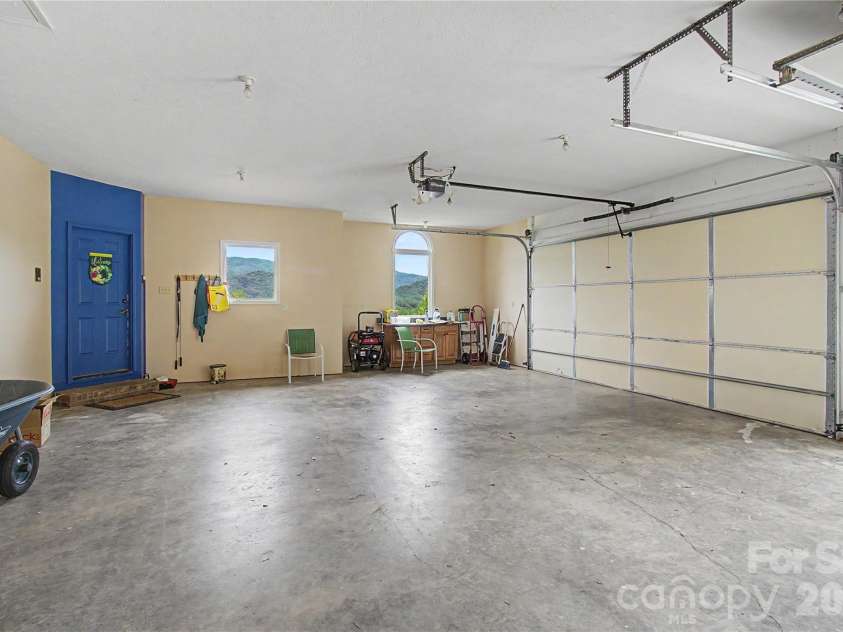 340 Earlys Mountain Road, Leicester, NC 28748.  MLS# CAR4398900, YatesRealty ID 34431. Oversized three car garage