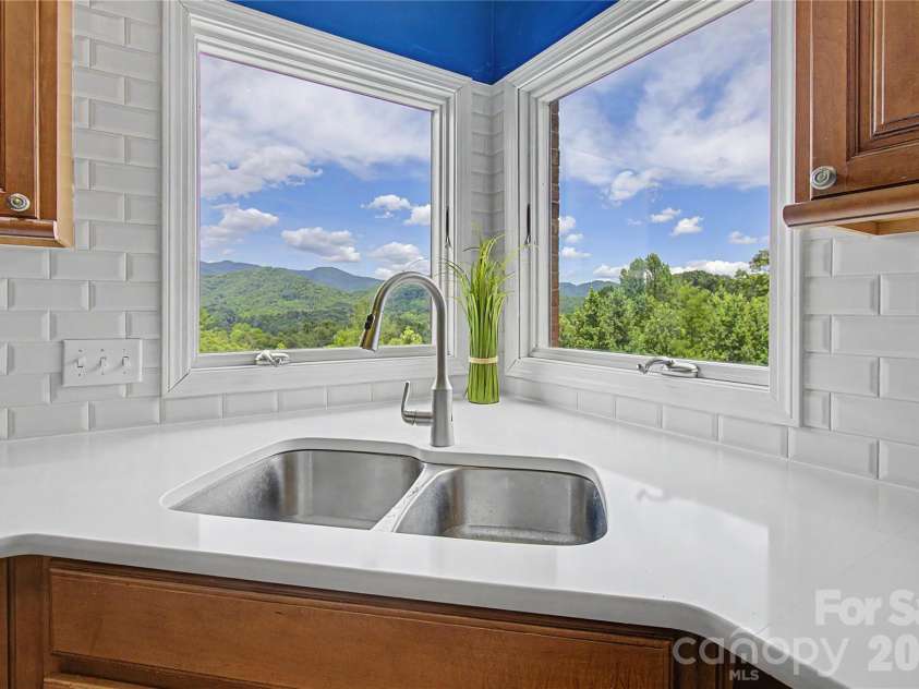 340 Earlys Mountain Road, Leicester, NC 28748.  MLS# CAR4398900, YatesRealty ID 34431. Who wouldn't want to wash dishes looking at this view!