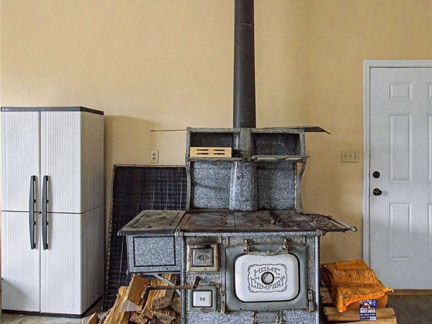 340 Earlys Mountain Road, Leicester, NC 28748.  MLS# CAR4398900, YatesRealty ID 34431. Wood stove conveys