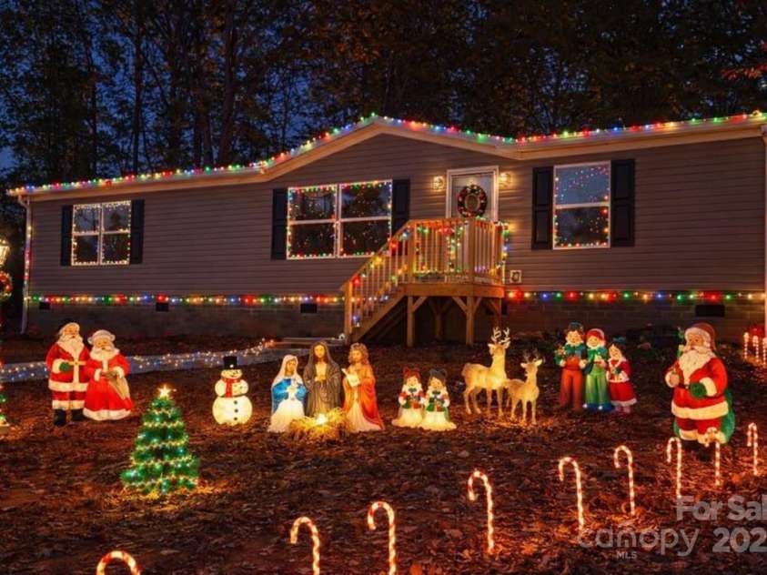 175 Shilah Lane Drive, Nebo, NC 28761.  MLS# CAR4289427, YatesRealty ID 34432. AI enhanced photo 