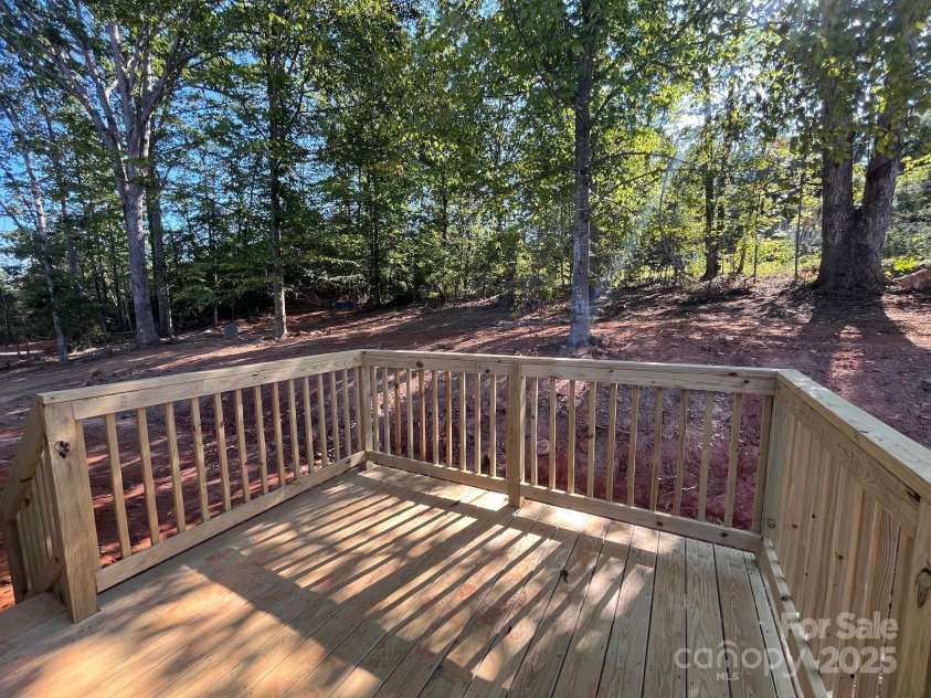 175 Shilah Lane Drive, Nebo, NC 28761.  MLS# CAR4289427, YatesRealty ID 34432. Back deck overlooking the backyard. 