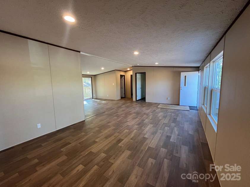 175 Shilah Lane Drive, Nebo, NC 28761.  MLS# CAR4289427, YatesRealty ID 34432. Large Living Room 