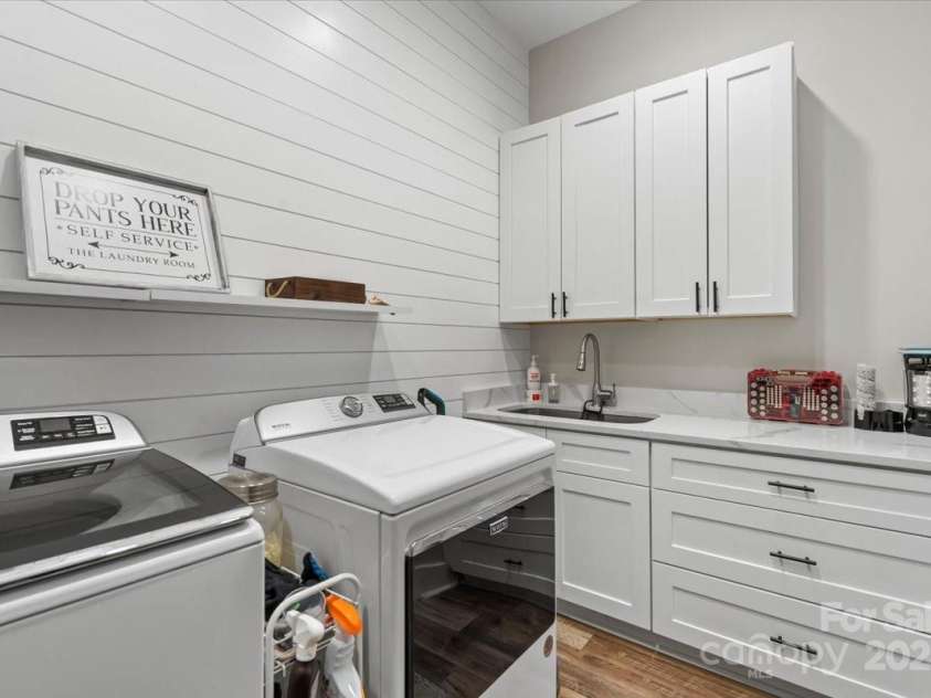 867 Bellegray Road, Clover, SC 29710.  MLS# CAR4262623, YatesRealty ID 34439. Large laundry room on main look at all that storage!